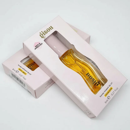 The Golden Veil Lip Gloss~by Gisou · Honey-Infused Collection